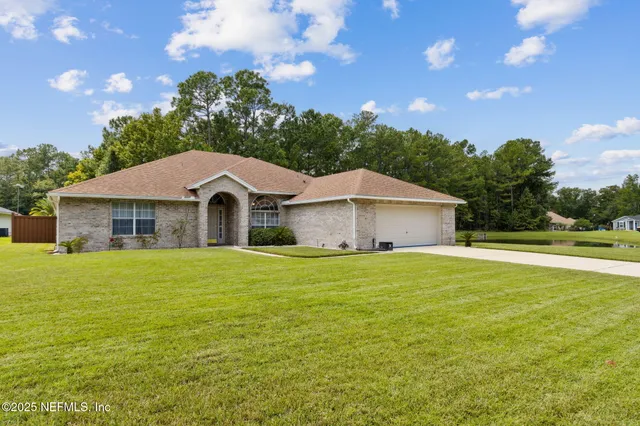 a house with yard in front of it