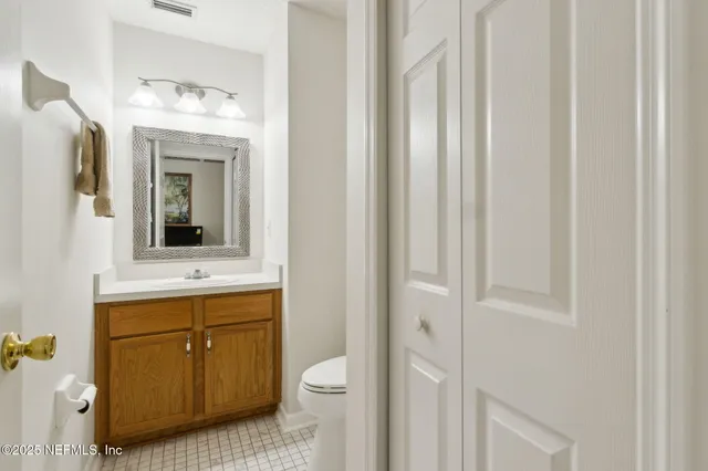 a utility room with cabinets