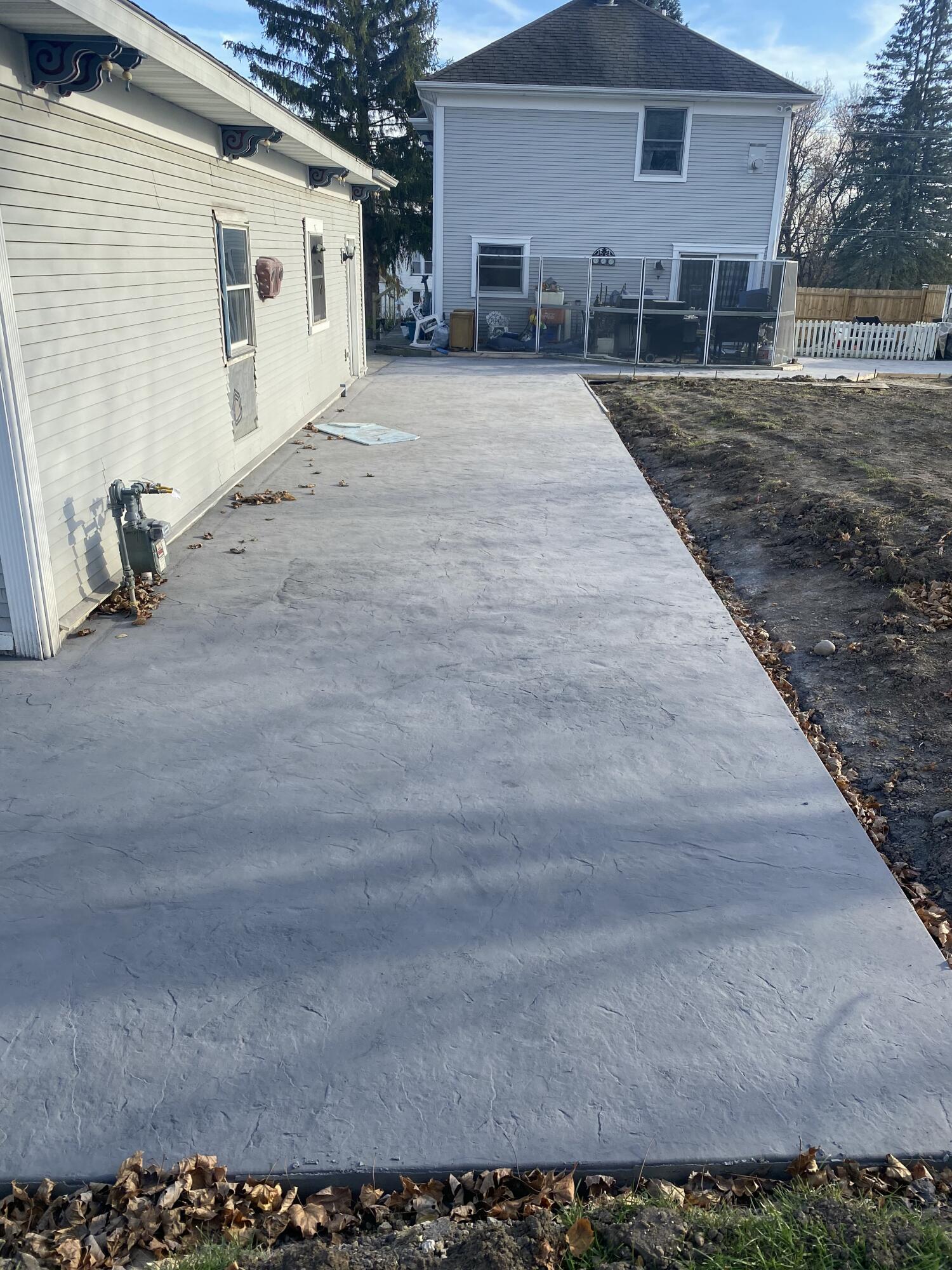 222 West Beloit Street Darien, WI 53114 - Photo 8 of 23 Garage concrete Patio