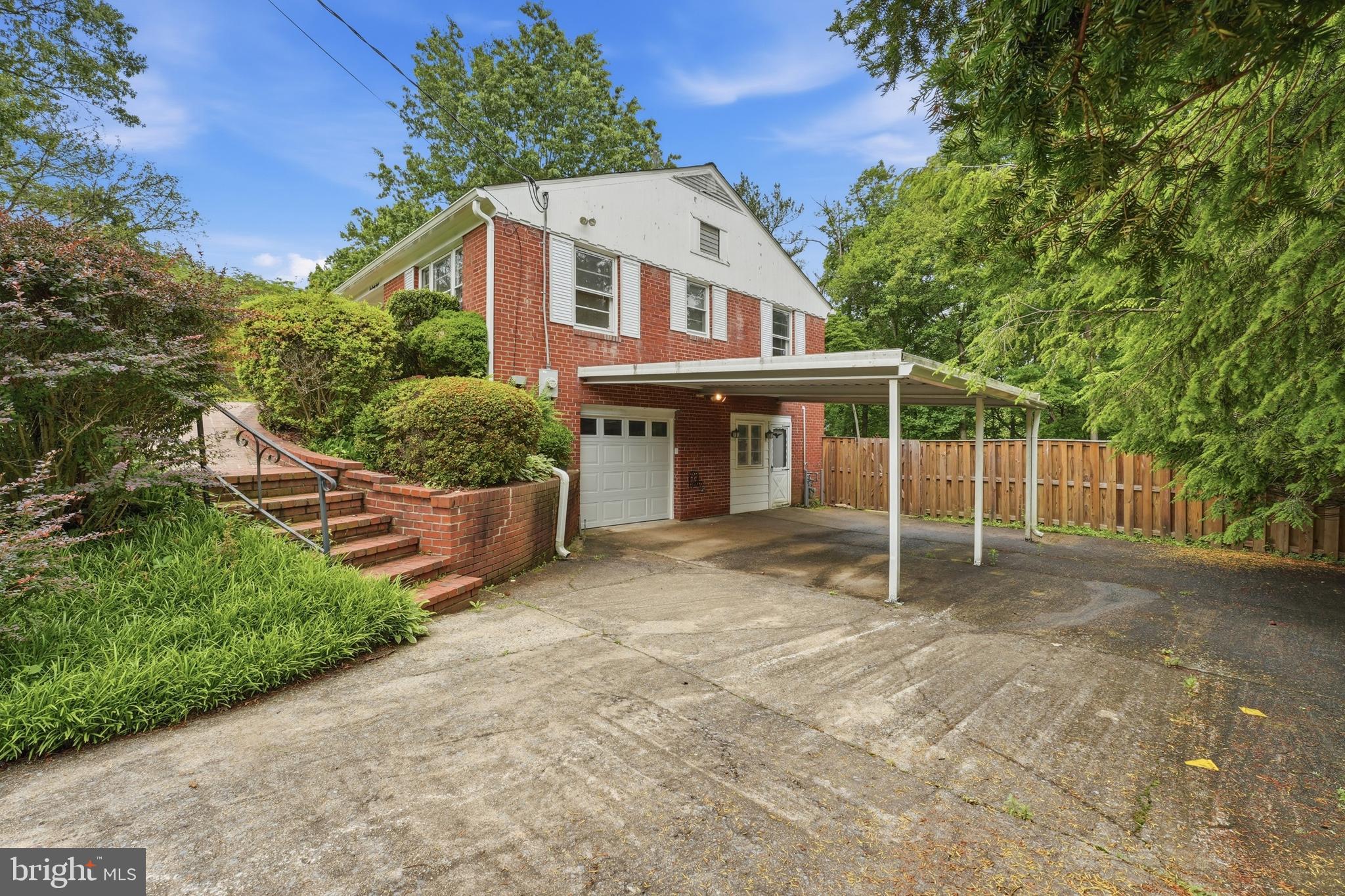 228 Northwest Terrace Silver Spring, MD 20901 - Photo 68 of 70 a view of a house with a yard and a large tree