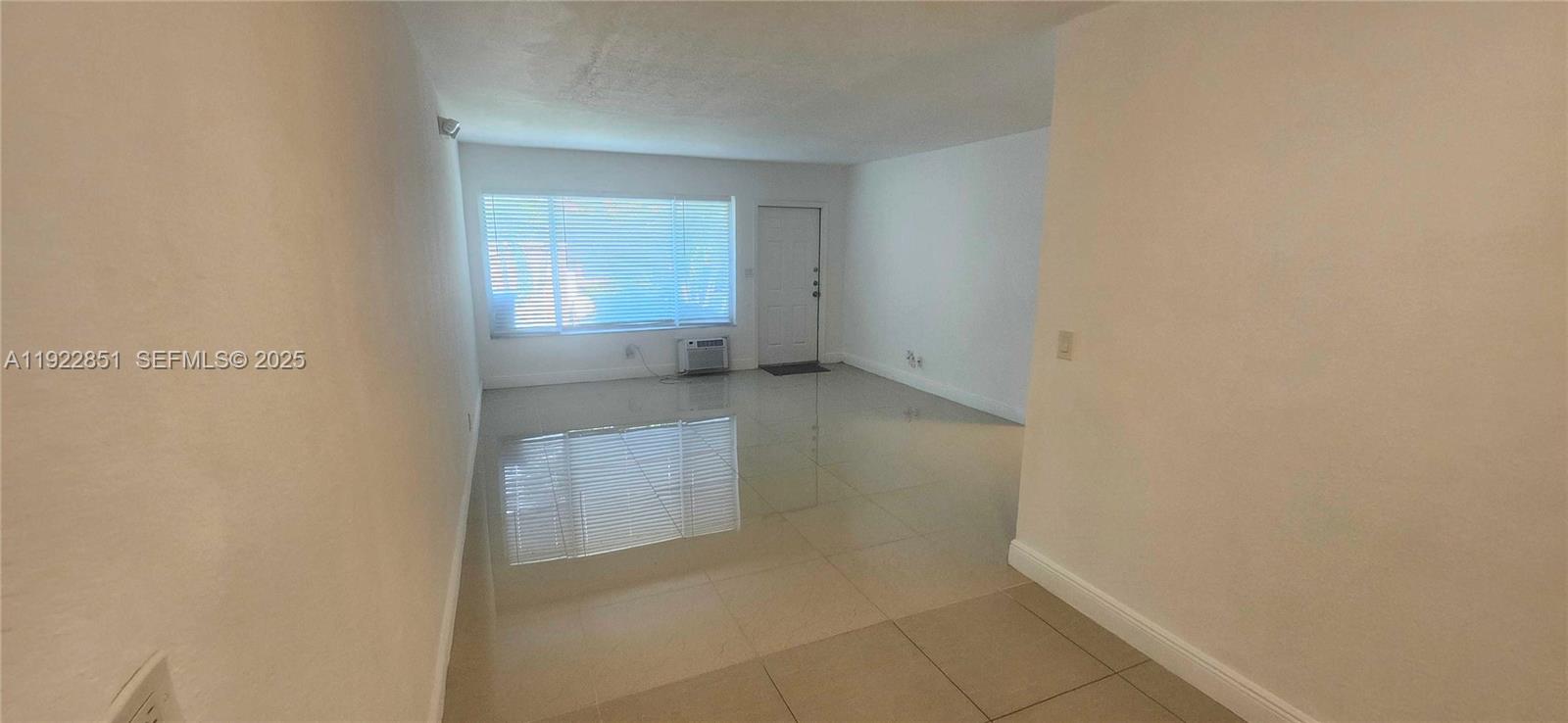 1050 98th Street, Unit 2W Bay Harbor Islands, FL 33154 - Photo 5 of 9 a view of room and window