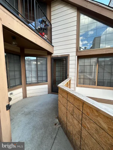 a view of a house with a large window