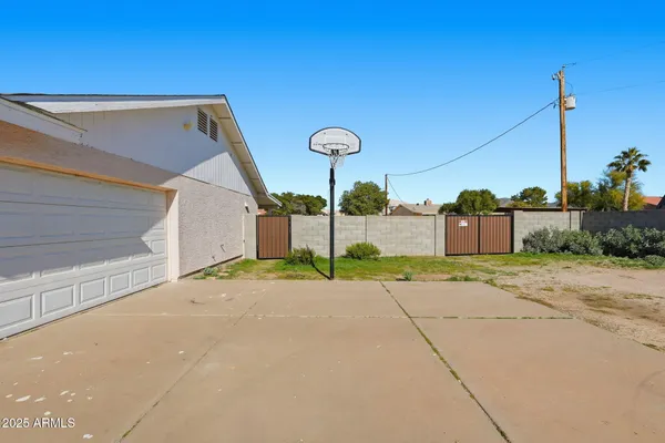 a view of a back yard of the house