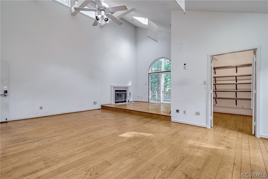 12955 River Road Richmond, VA 23238 - Photo 10 of 32 Primary bedroom with sitting area, wood floors, d