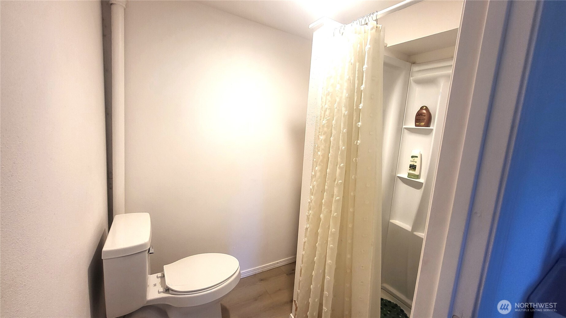 202 South 4th Street Odessa, WA 99159 - Photo 16 of 23 a white toilet sitting next to a bathroom sink