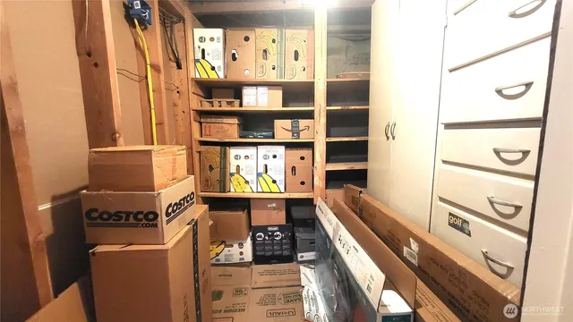 a storage room with washer and dryer