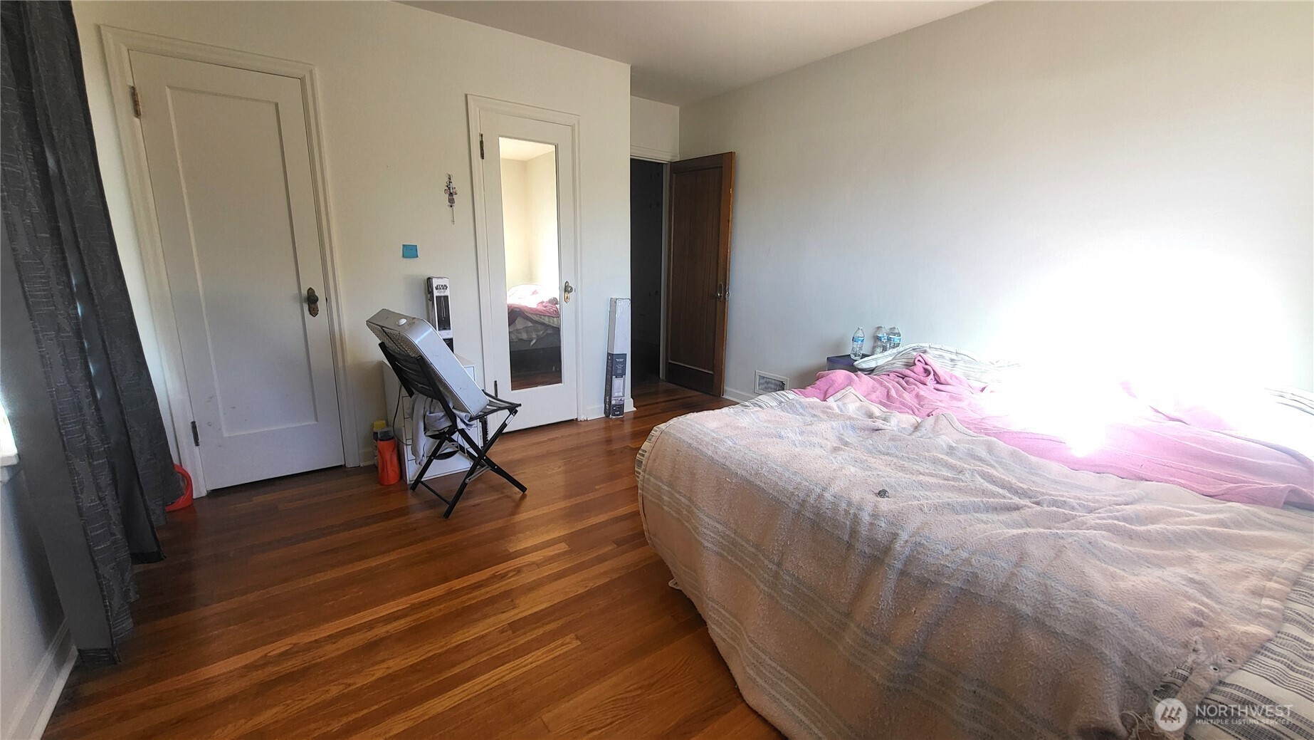 202 South 4th Street Odessa, WA 99159 - Photo 9 of 23 a bedroom with a bed and a window