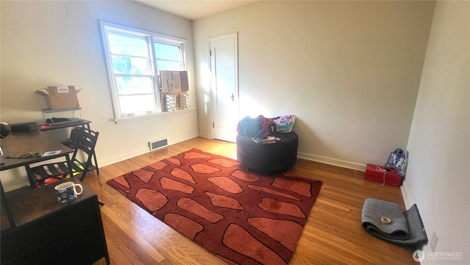 202 South 4th Street Odessa, WA 99159 - Photo 10 of 23 a bed sitting in a bedroom next to a window