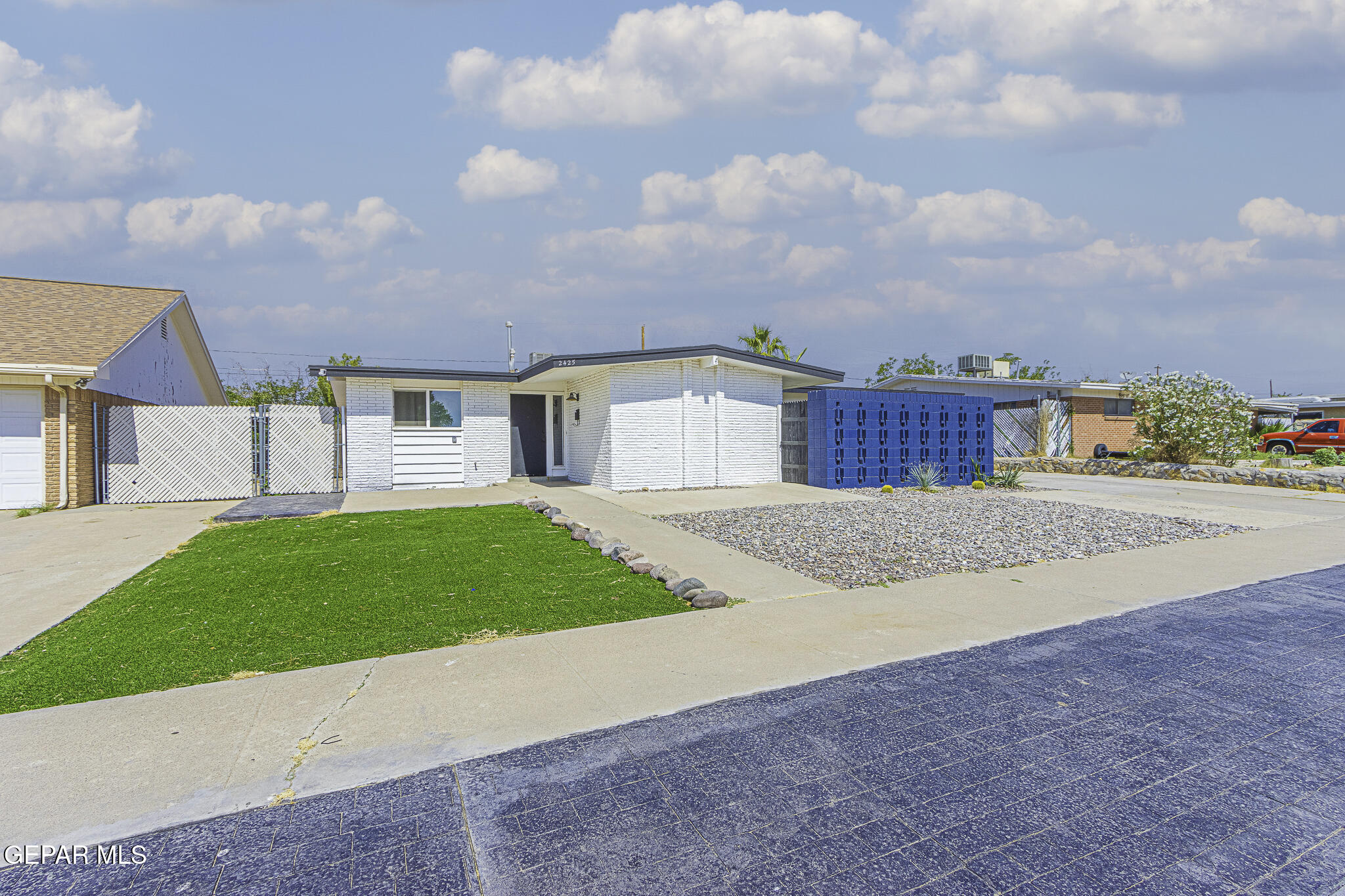 a view of house with outdoor space and street view