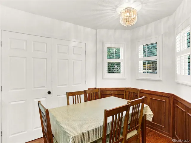 a view of a dining room that has a table and chair