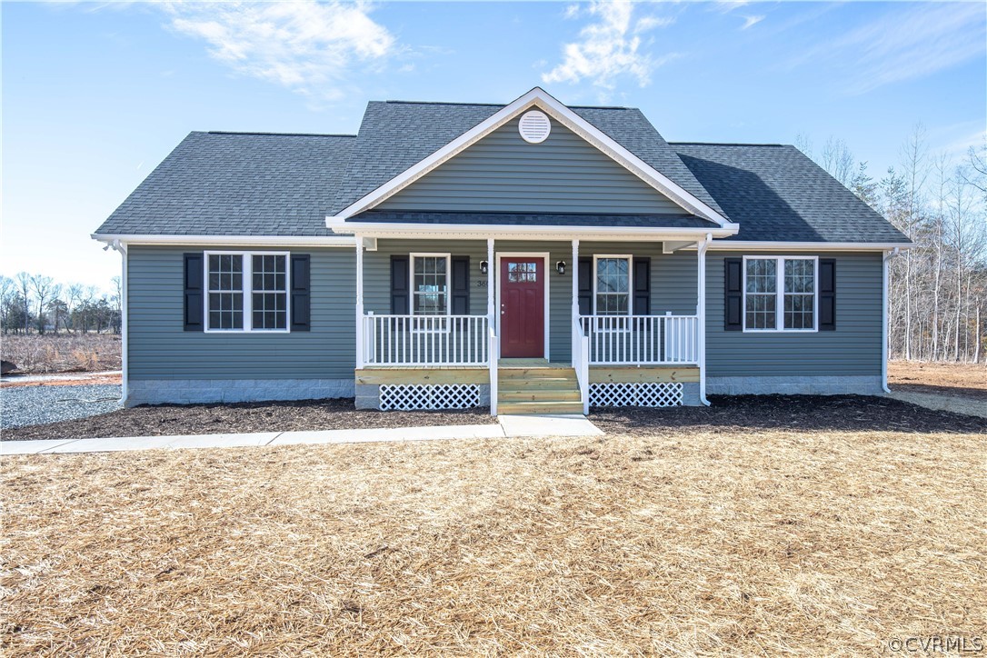 front view of a house with a yard