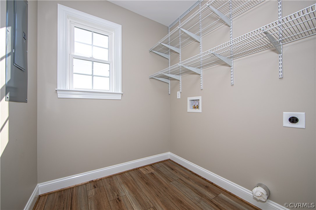 360 Vogel Road Cumberland, VA 23040 - Photo 14 of 25 an empty room with wooden floor and windows