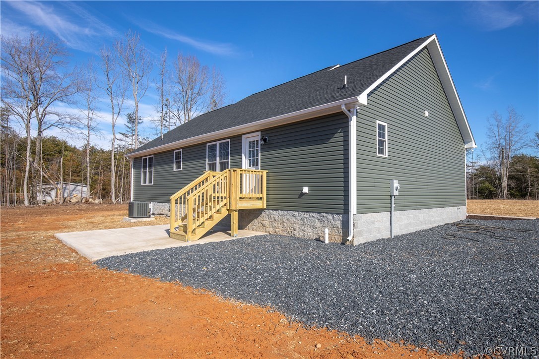 360 Vogel Road Cumberland, VA 23040 - Photo 2 of 25 a view of a house with a patio and a yard