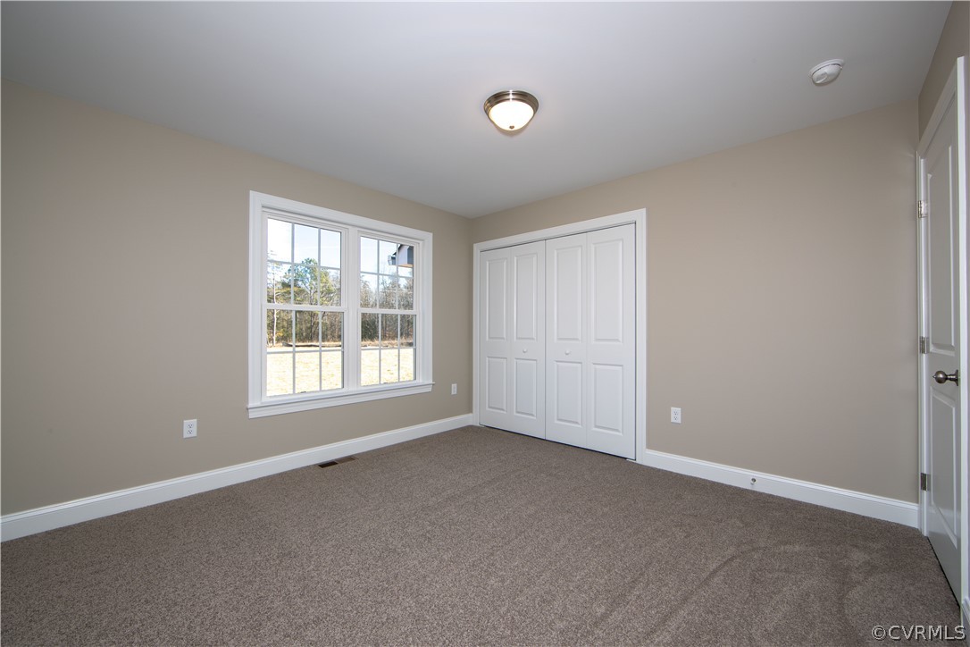 360 Vogel Road Cumberland, VA 23040 - Photo 21 of 25 an empty room with a window