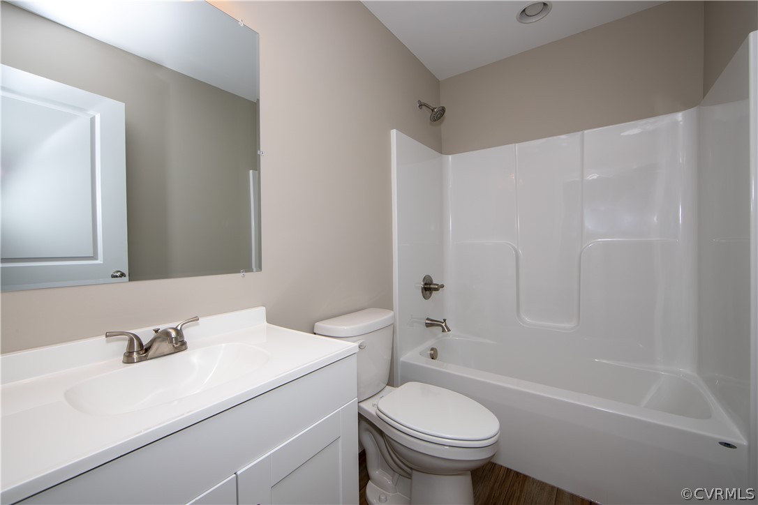 360 Vogel Road Cumberland, VA 23040 - Photo 22 of 25 a bathroom with a sink toilet vanity and bathtub
