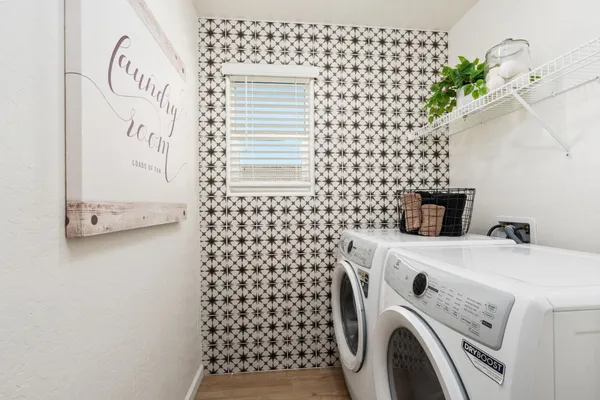 a utility room with dryer and washer