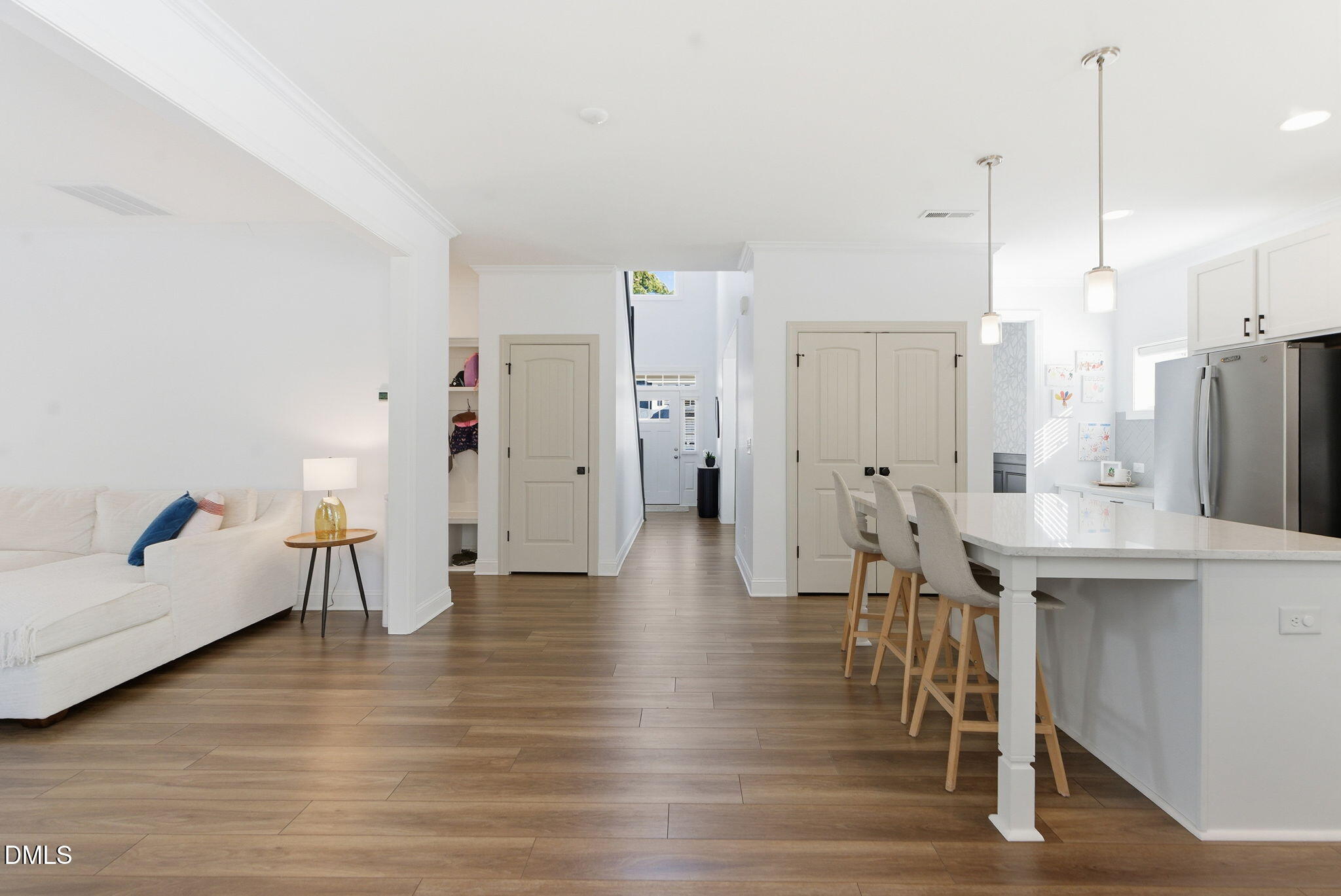 513 Ingram Ridge Court Knightdale, NC 27545 - Photo 14 of 74 a view of a kitchen with furniture and wooden floor
