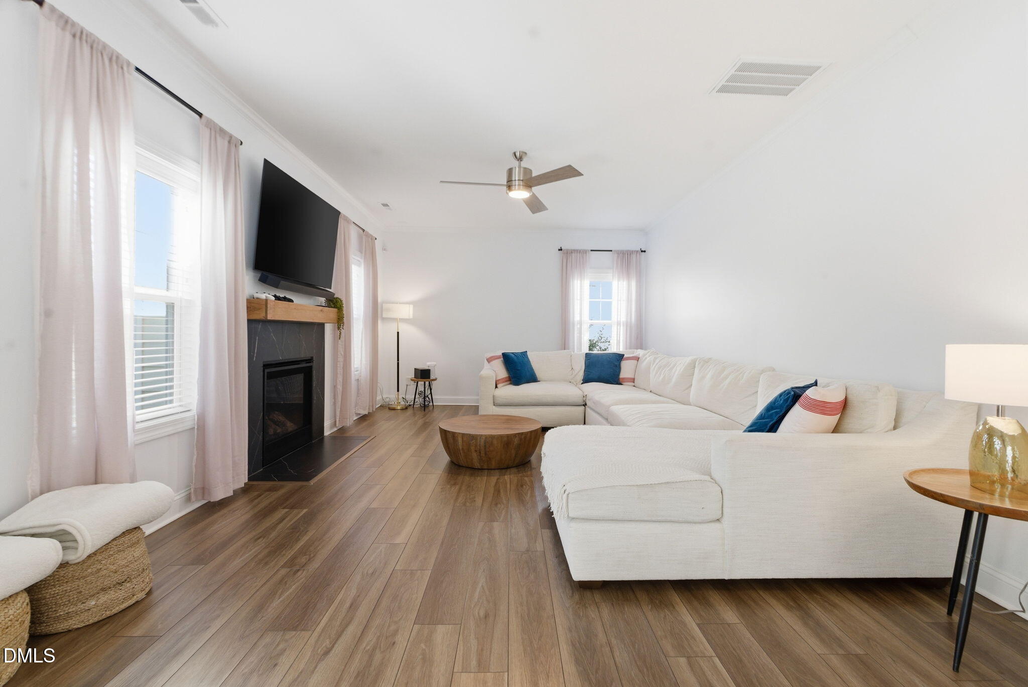 513 Ingram Ridge Court Knightdale, NC 27545 - Photo 28 of 74 a living room with furniture and a fireplace