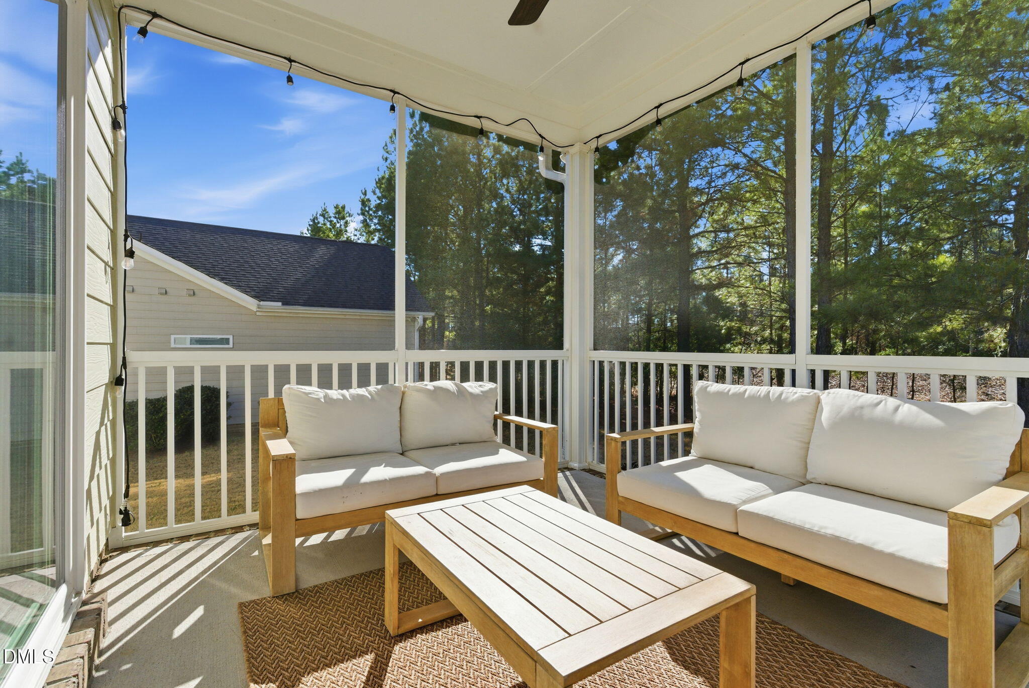 513 Ingram Ridge Court Knightdale, NC 27545 - Photo 35 of 74 a view of a patio with a table and chairs