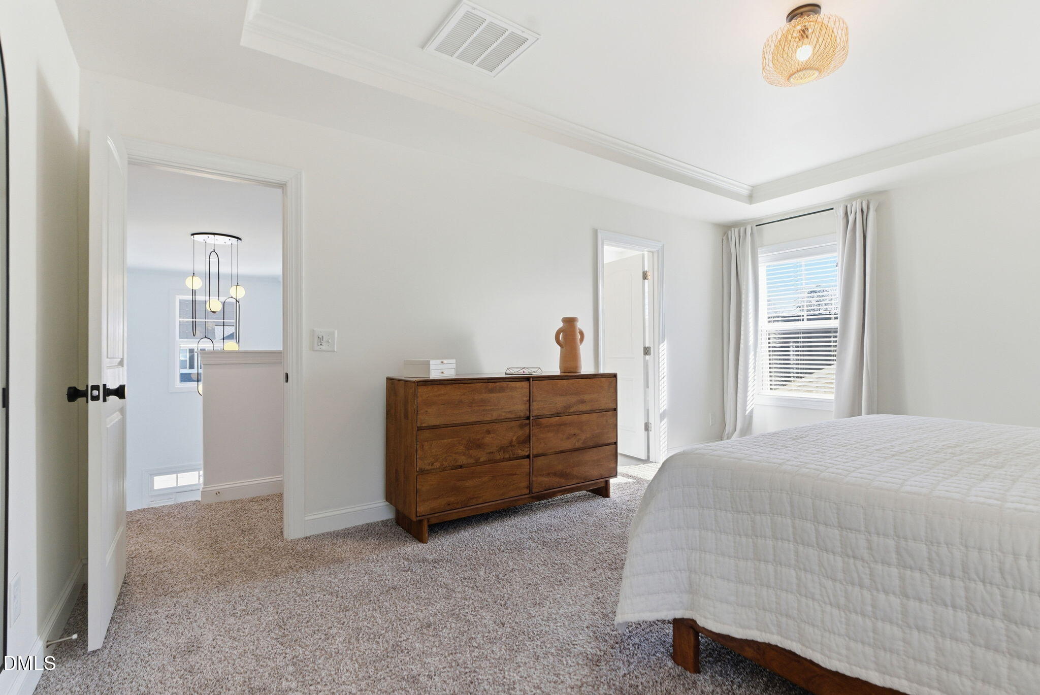 513 Ingram Ridge Court Knightdale, NC 27545 - Photo 42 of 74 a bedroom with a bed and a window