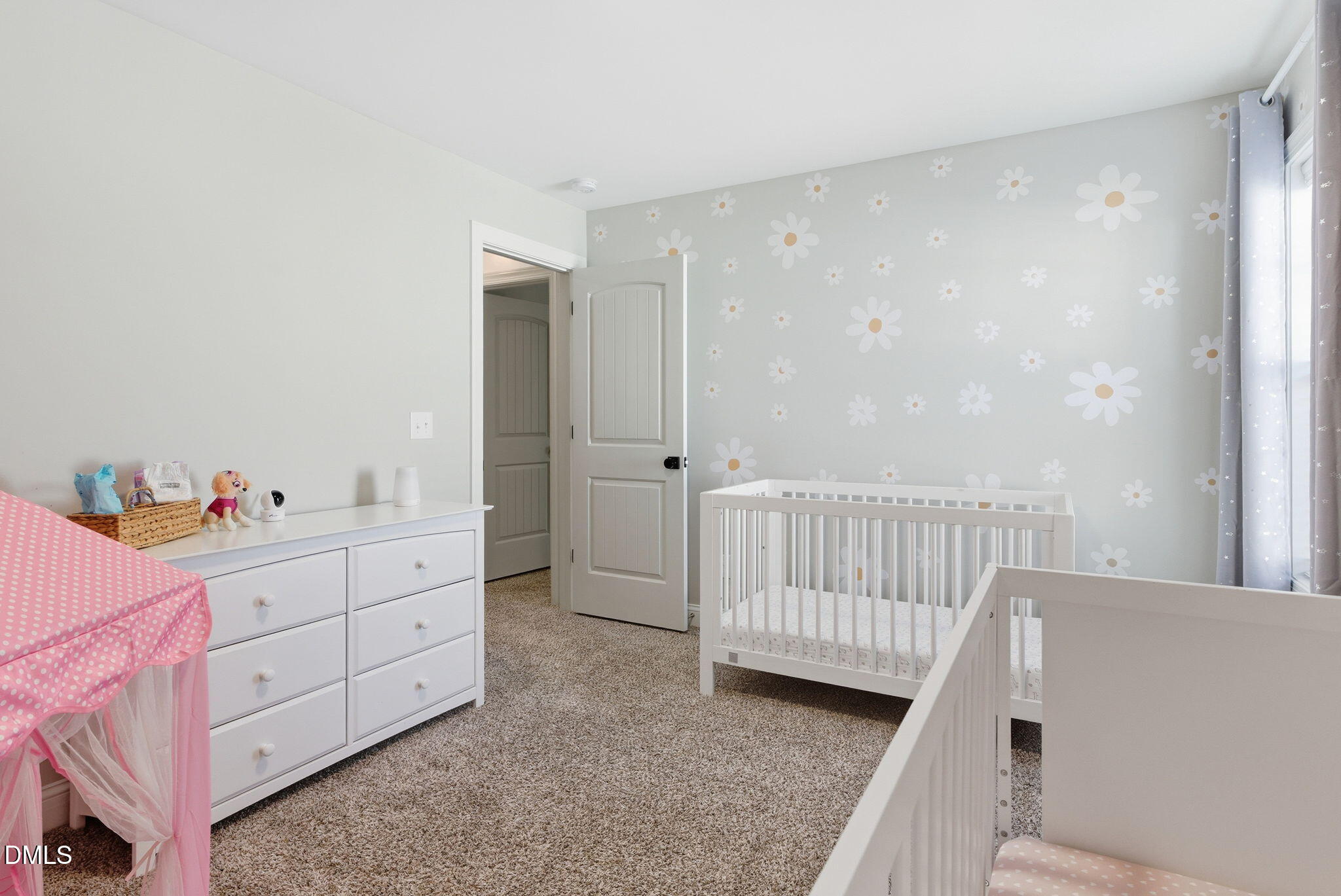 513 Ingram Ridge Court Knightdale, NC 27545 - Photo 62 of 74 a view of a bedroom with baby crib and dresser