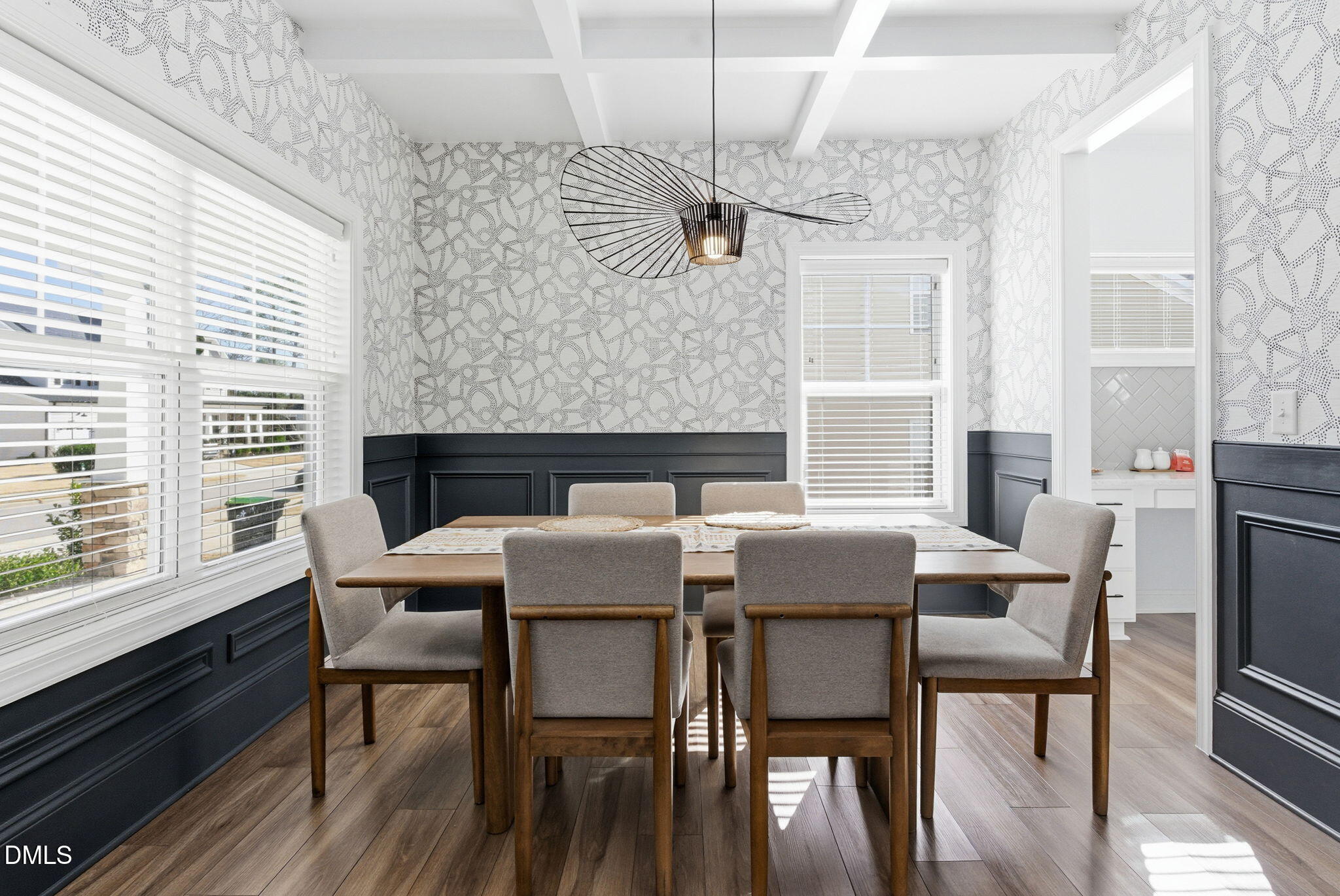 513 Ingram Ridge Court Knightdale, NC 27545 - Photo 10 of 74 a dining room with furniture a chandelier and wooden floor