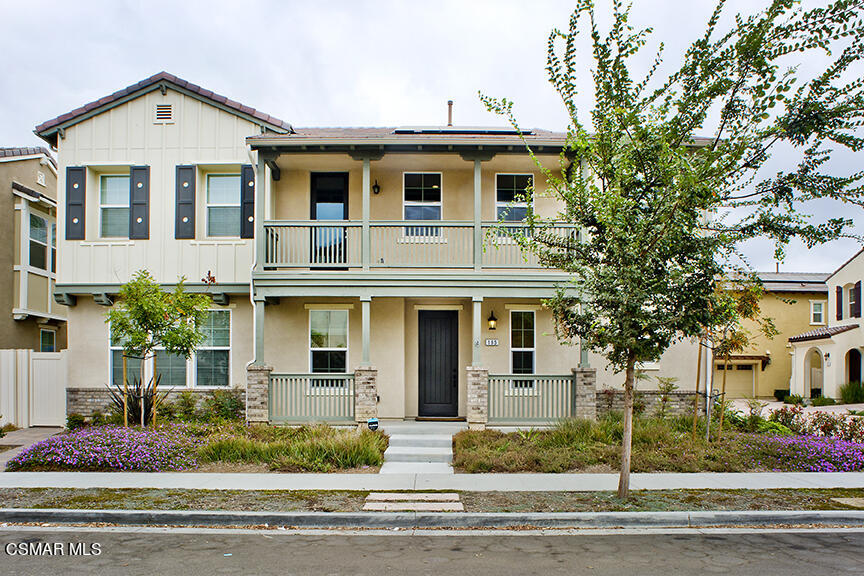 165 Stonegate Road Camarillo, CA 93010 - Photo 1 of 33 a front view of a house with a garden