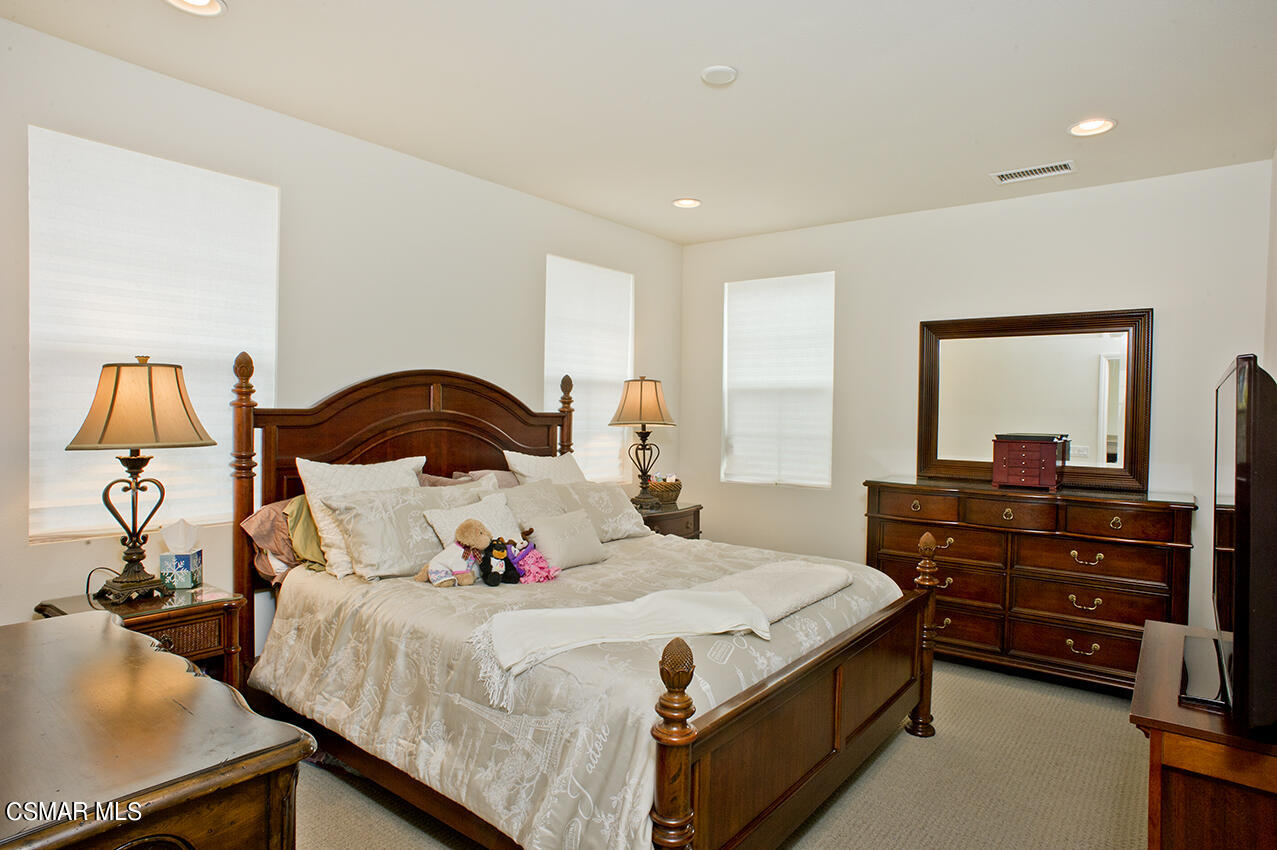 165 Stonegate Road Camarillo, CA 93010 - Photo 19 of 33 a bedroom with a bed and a dresser