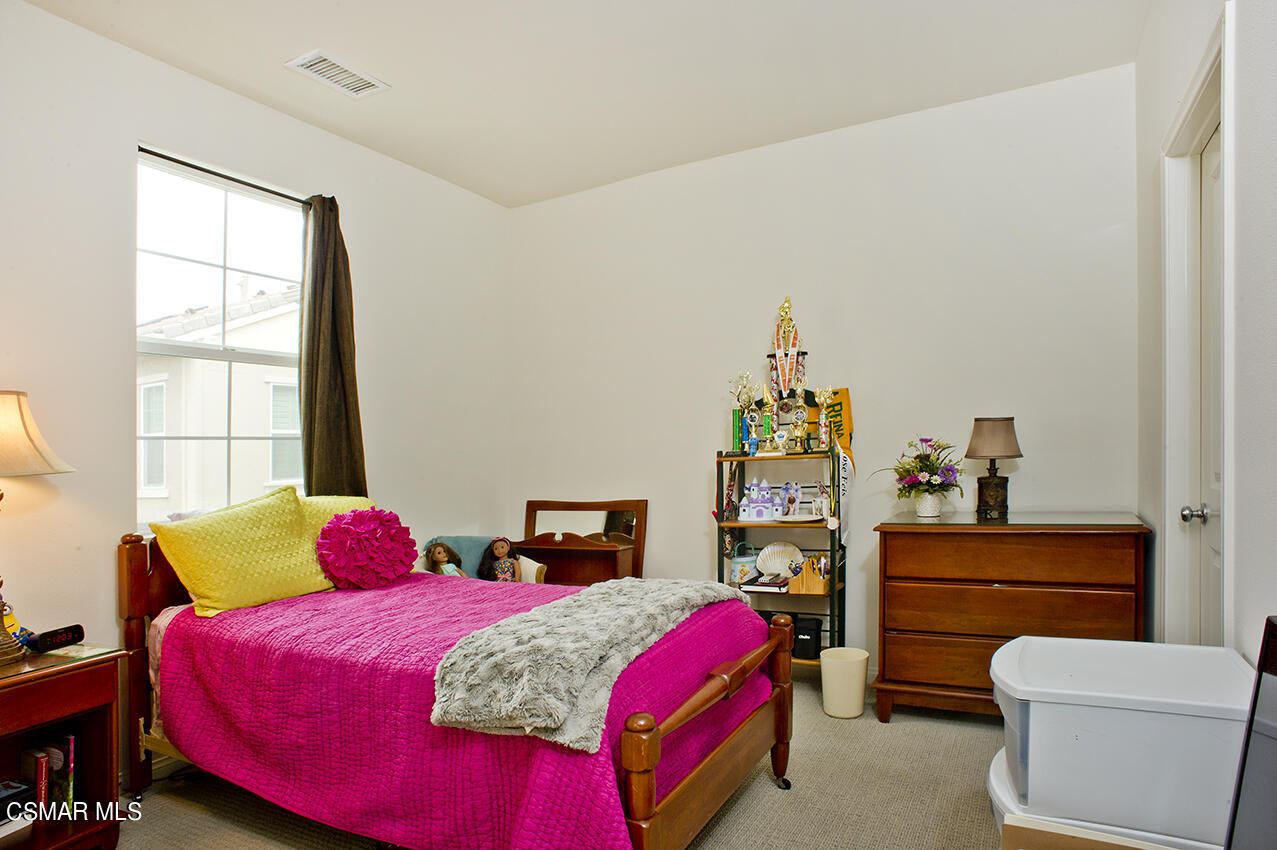 165 Stonegate Road Camarillo, CA 93010 - Photo 22 of 33 a bedroom with a bed and a window