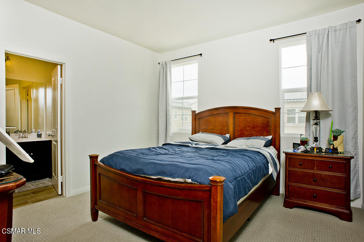 165 Stonegate Road Camarillo, CA 93010 - Photo 23 of 33 a bedroom with a bed and a dresser in it