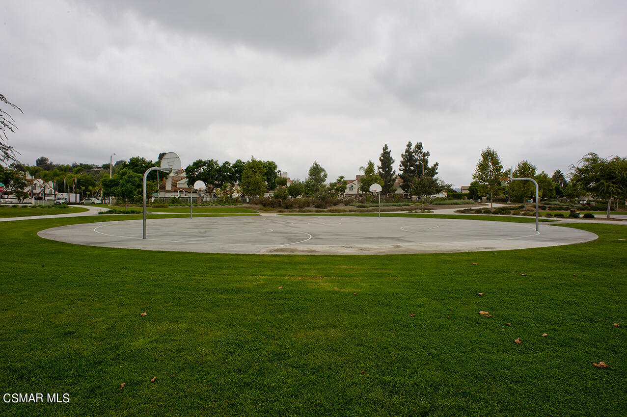 165 Stonegate Road Camarillo, CA 93010 - Photo 31 of 33 a view of a golf course with a lake