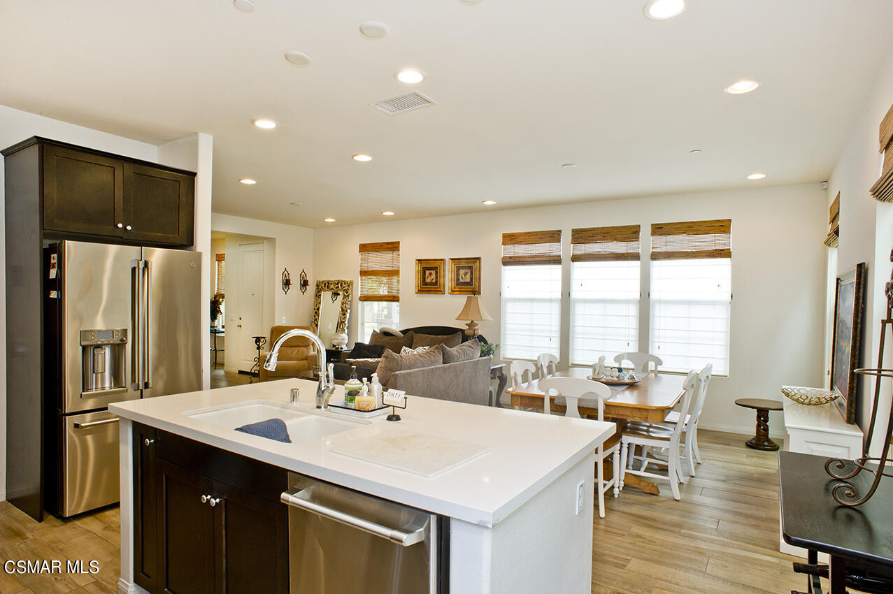 165 Stonegate Road Camarillo, CA 93010 - Photo 9 of 33 a kitchen with a sink stove and refrigerator