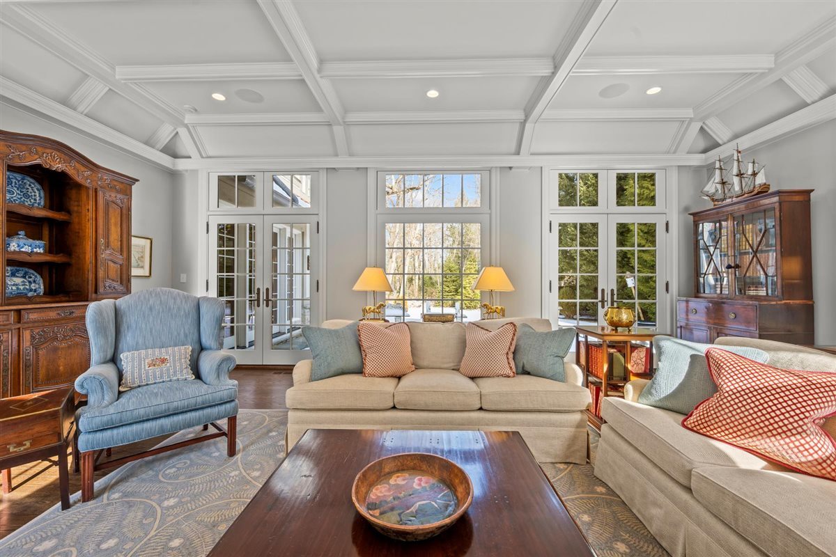 745 East Woodland Road Lake Forest, IL 60045 - Photo 33 of 77 a living room with furniture and a large window
