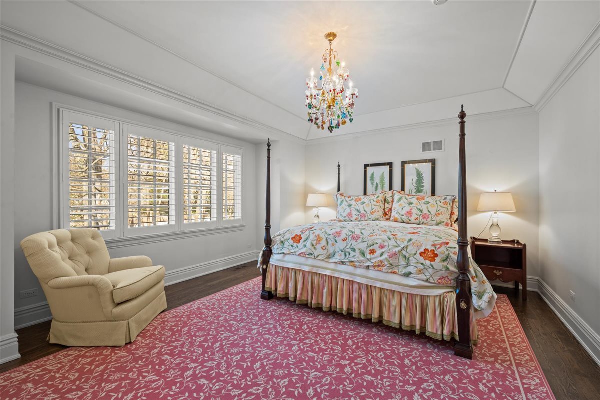 745 East Woodland Road Lake Forest, IL 60045 - Photo 50 of 77 a bedroom with bed and a large window