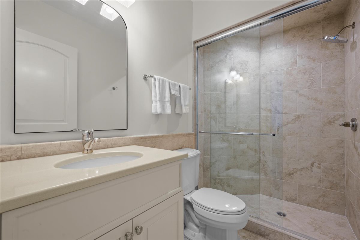 745 East Woodland Road Lake Forest, IL 60045 - Photo 53 of 77 a bathroom with a sink toilet and shower