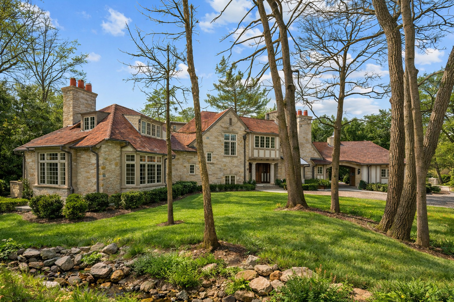 745 East Woodland Road Lake Forest, IL 60045 - Photo 75 of 77 a view of a house with backyard and a tree
