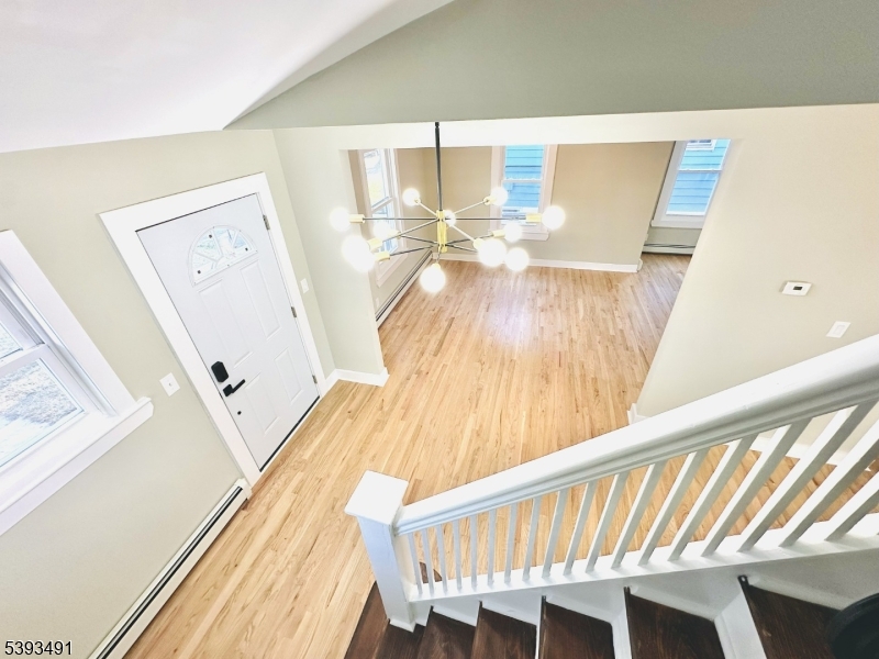 1222 West 3rd Street Plainfield, NJ 07063 - Photo 12 of 50 a view of a living room with furniture and wooden floor