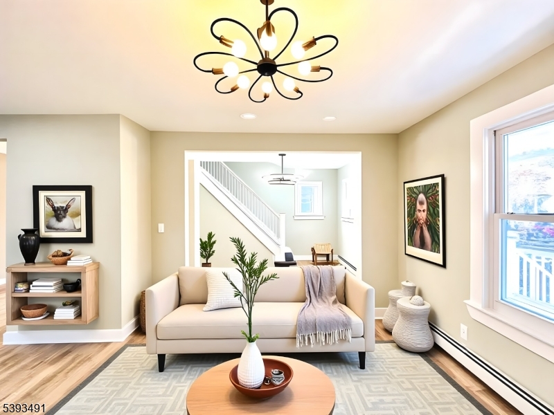 1222 West 3rd Street Plainfield, NJ 07063 - Photo 13 of 50 a living room with furniture