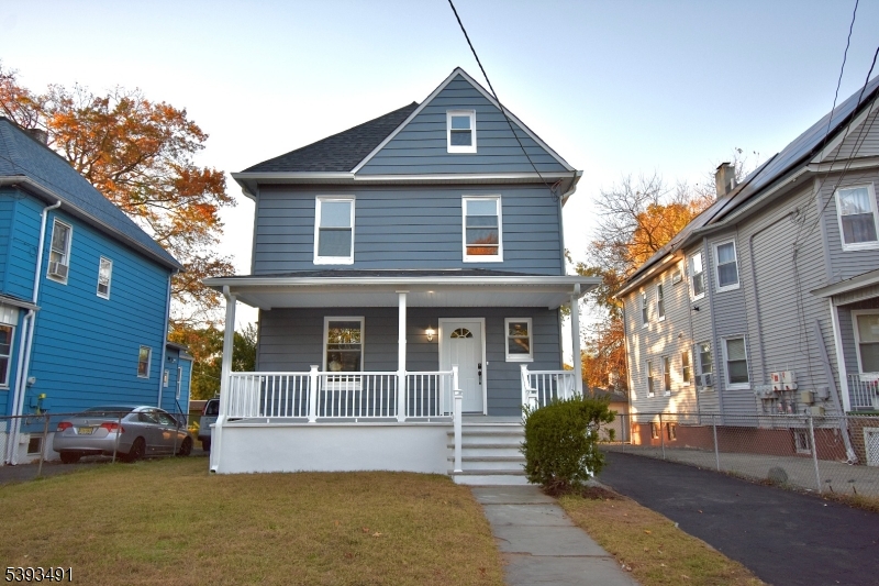 1222 West 3rd Street Plainfield, NJ 07063 - Photo 2 of 50 a front view of a house with garden