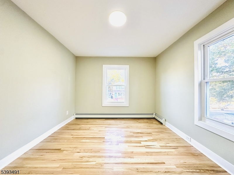 1222 West 3rd Street Plainfield, NJ 07063 - Photo 32 of 50 a view of an empty room with a window