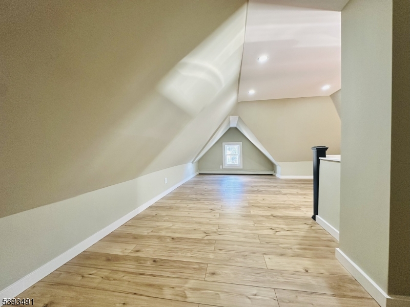 1222 West 3rd Street Plainfield, NJ 07063 - Photo 37 of 50 a view of a hallway with wooden floor