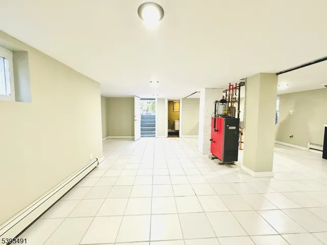 a view of a entryway with furniture and a window