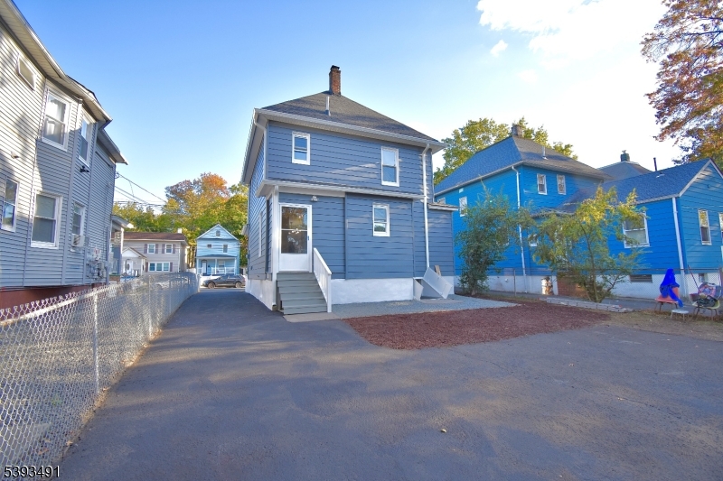 1222 West 3rd Street Plainfield, NJ 07063 - Photo 50 of 50 a view of a house with a yard