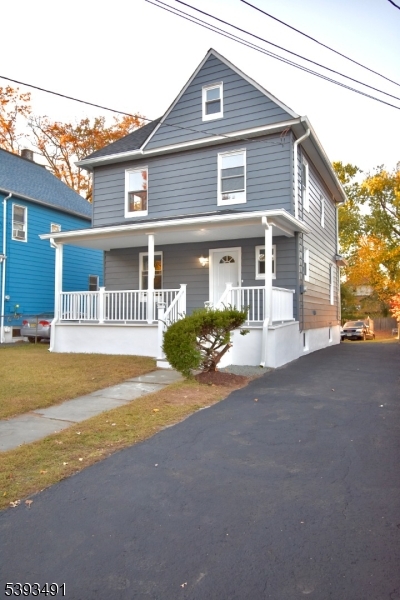 1222 West 3rd Street Plainfield, NJ 07063 - Photo 5 of 50 a view of a house with a patio