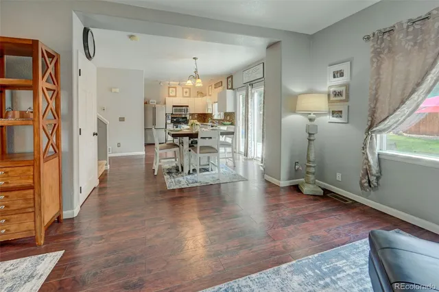 a view of livingroom with furniture and wooden floor