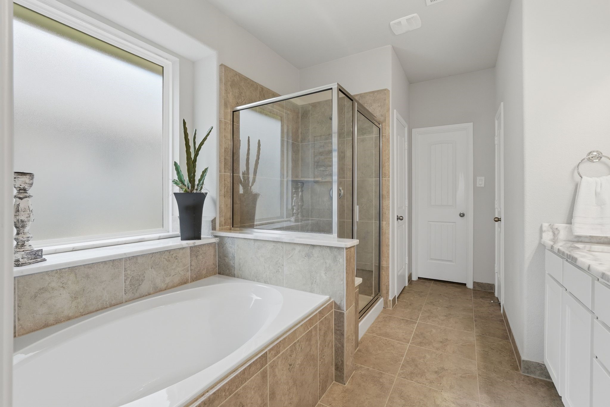 7522 Windsor View Drive Spring, TX 77379 - Photo 27 of 49 Large soaking tub and walk-in shower create a peaceful place to unwind.