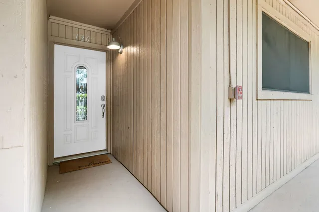 a view of a hallway with entryway