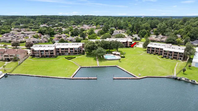 an aerial view of a chairs and table on the terrace