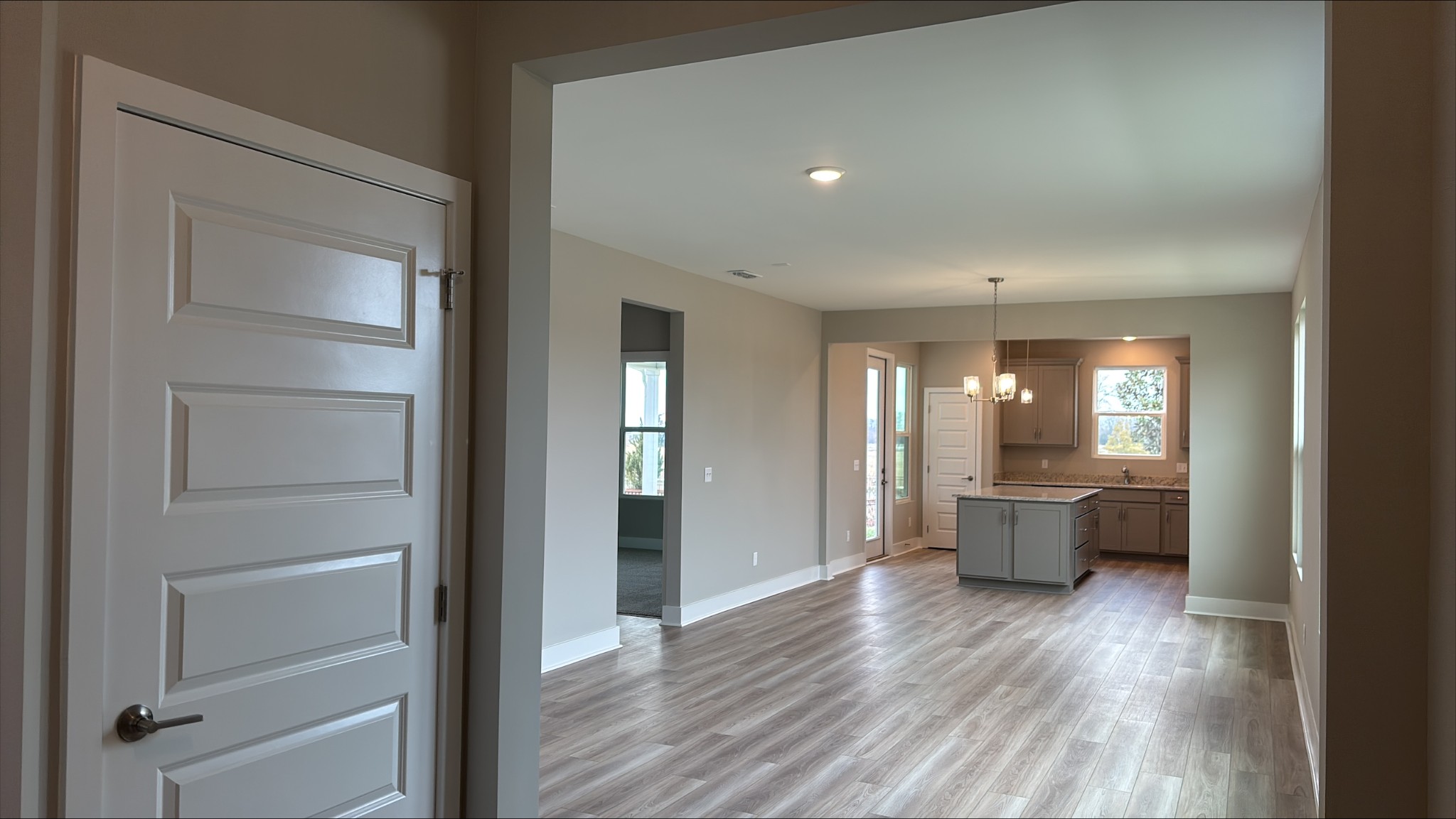 500 Compass Lebanon, TN 37090 - Photo 4 of 42 a view of living room and bedroom with wooden floor