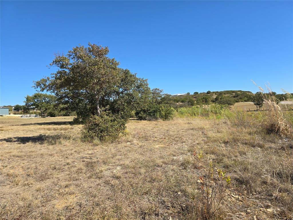 133 Scenic Ridge Drive, Unit LOT 22 Cisco, TX 76437 - Photo 6 of 22 a view of lake with mountain view
